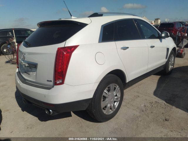 Photo 3 VIN: 3GYFNBE32ES526036 - CADILLAC SRX 