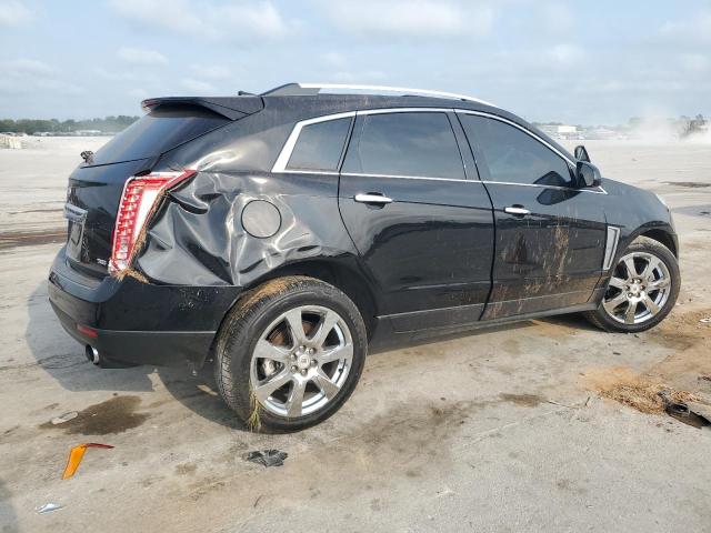 Photo 2 VIN: 3GYFNBE32ES561210 - CADILLAC SRX LUXURY 