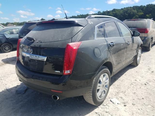 Photo 3 VIN: 3GYFNBE32ES585412 - CADILLAC SRX 