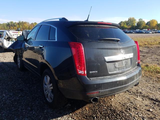 Photo 2 VIN: 3GYFNBE32ES596992 - CADILLAC SRX LUXURY 