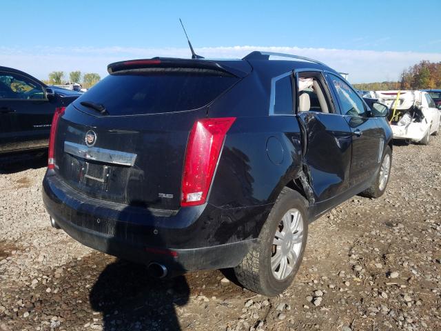 Photo 3 VIN: 3GYFNBE32ES596992 - CADILLAC SRX LUXURY 