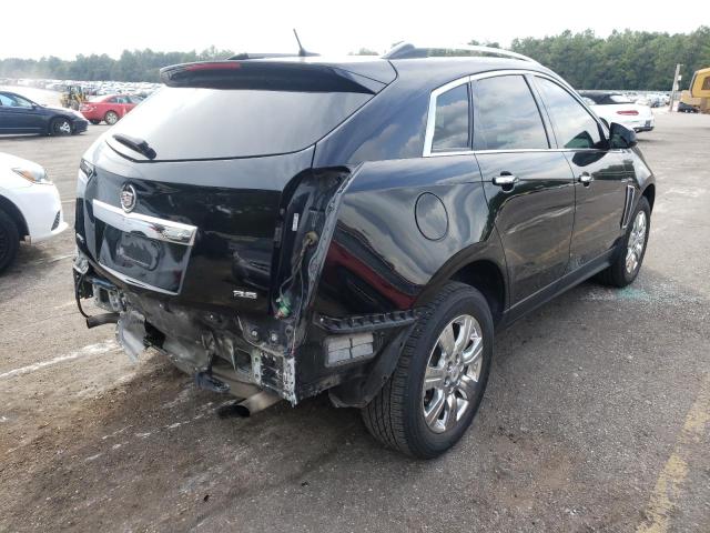 Photo 3 VIN: 3GYFNBE32ES616061 - CADILLAC SRX LUXURY 