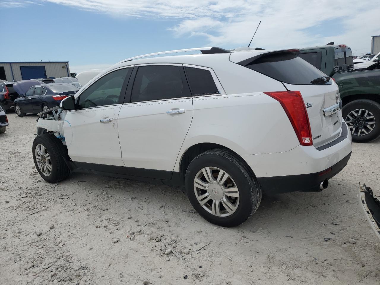 Photo 1 VIN: 3GYFNBE32GS516268 - CADILLAC SRX 