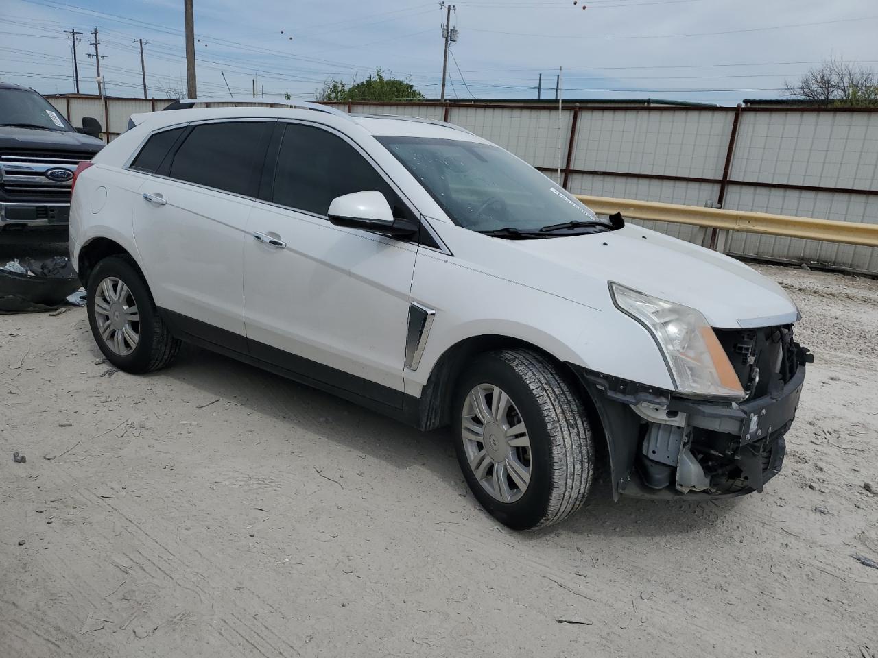 Photo 3 VIN: 3GYFNBE32GS516268 - CADILLAC SRX 