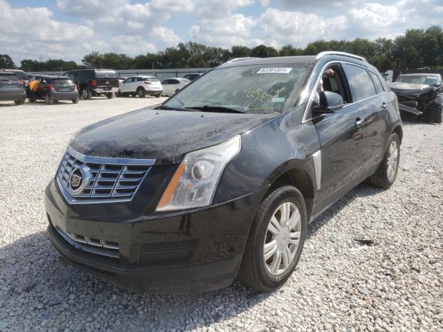 Photo 1 VIN: 3GYFNBE32GS531384 - CADILLAC SRX LUXURY 