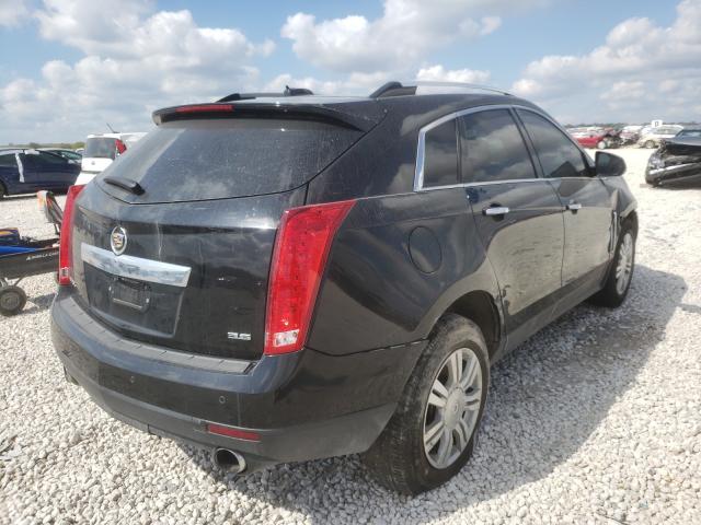 Photo 3 VIN: 3GYFNBE32GS531384 - CADILLAC SRX LUXURY 