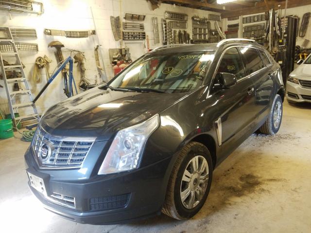 Photo 1 VIN: 3GYFNBE32GS540957 - CADILLAC SRX LUXURY 