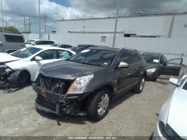 Photo 1 VIN: 3GYFNBE32GS577622 - CADILLAC SRX 