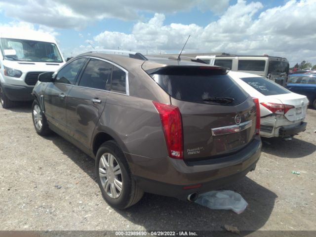 Photo 2 VIN: 3GYFNBE32GS577622 - CADILLAC SRX 