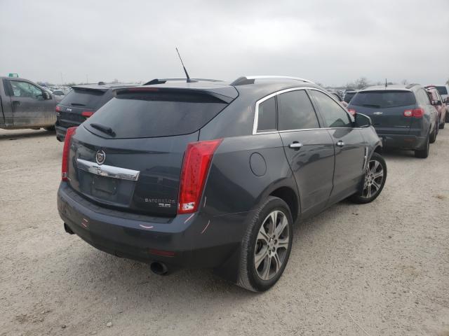 Photo 3 VIN: 3GYFNBE33CS586274 - CADILLAC SRX PERFOR 