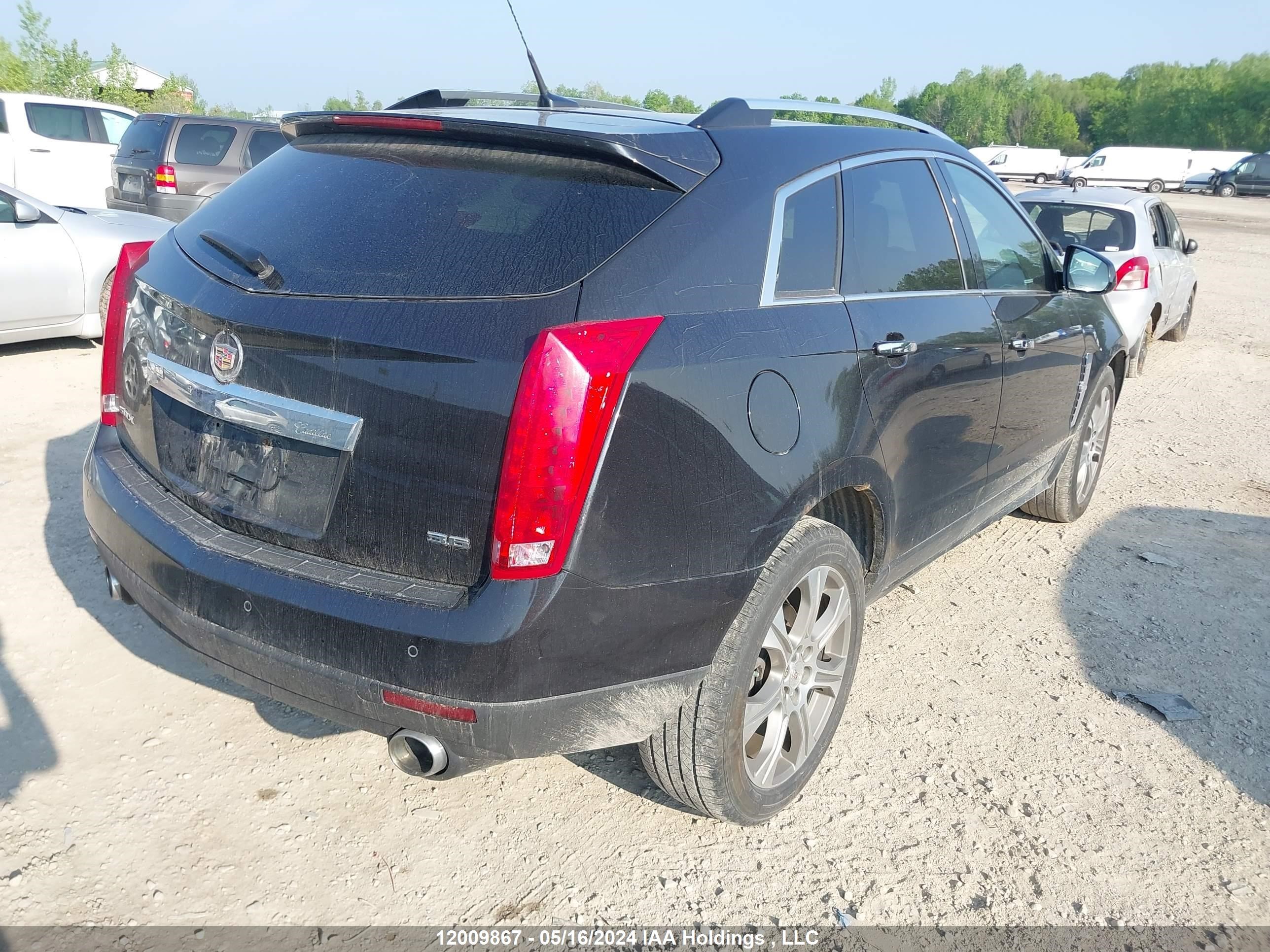 Photo 3 VIN: 3GYFNBE34CS582413 - CADILLAC SRX 