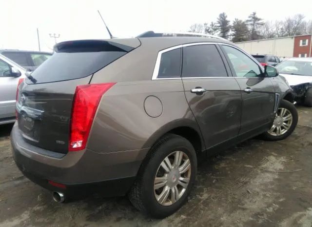 Photo 3 VIN: 3GYFNBE34ES585511 - CADILLAC SRX 