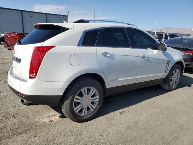 Photo 2 VIN: 3GYFNBE34ES641219 - CADILLAC SRX LUXURY 