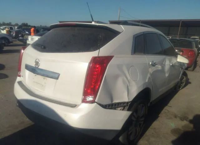 Photo 3 VIN: 3GYFNBE34ES679193 - CADILLAC SRX 