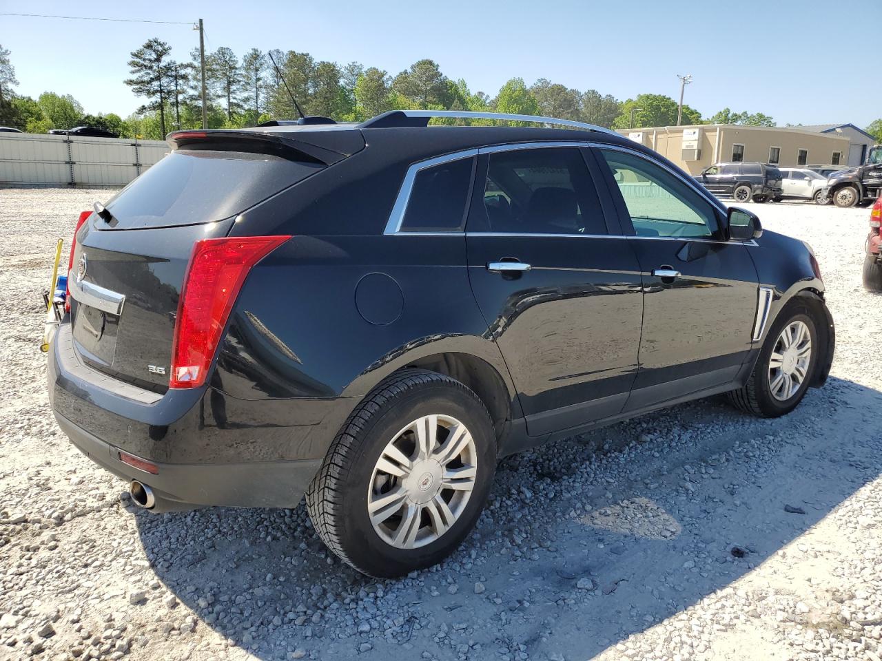 Photo 2 VIN: 3GYFNBE34GS516434 - CADILLAC SRX 