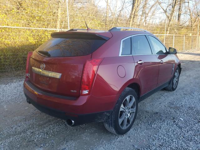 Photo 3 VIN: 3GYFNBE35CS597955 - CADILLAC SRX PERFOR 