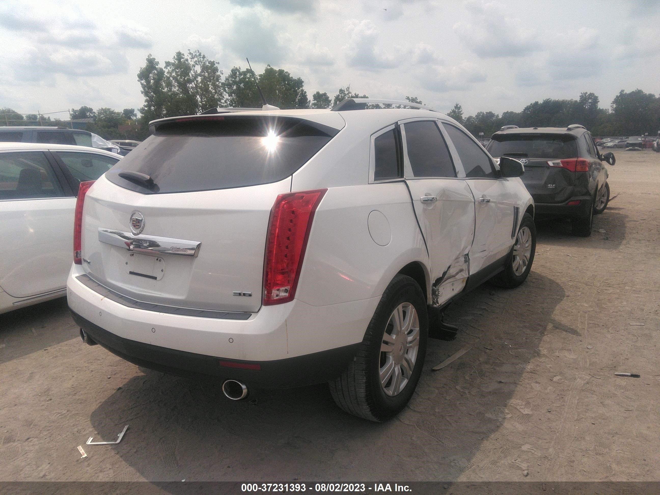 Photo 3 VIN: 3GYFNBE35ES538083 - CADILLAC SRX 