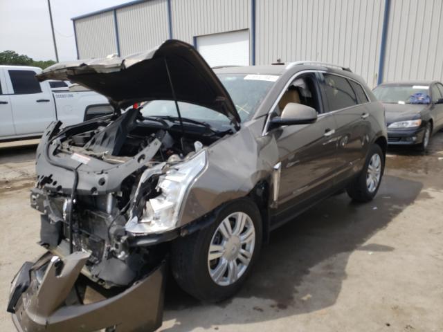 Photo 1 VIN: 3GYFNBE35GS558689 - CADILLAC SRX LUXURY 