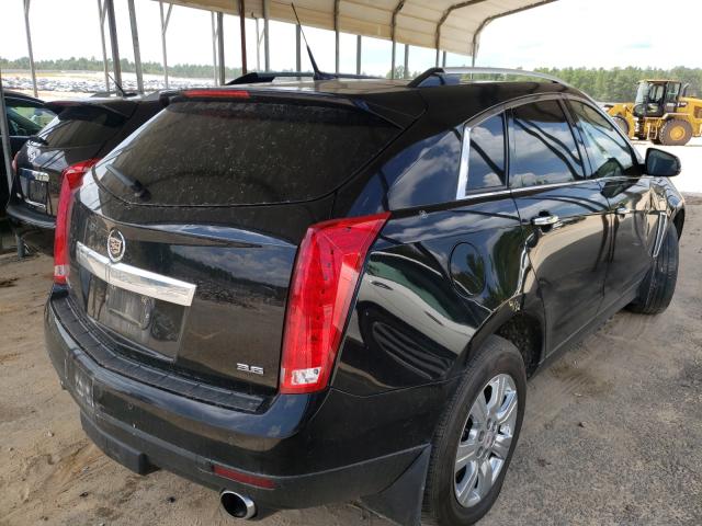 Photo 3 VIN: 3GYFNBE36ES611865 - CADILLAC SRX LUXURY 