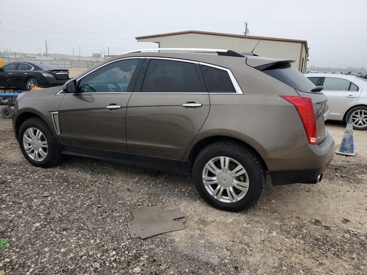 Photo 1 VIN: 3GYFNBE36GS509520 - CADILLAC SRX 