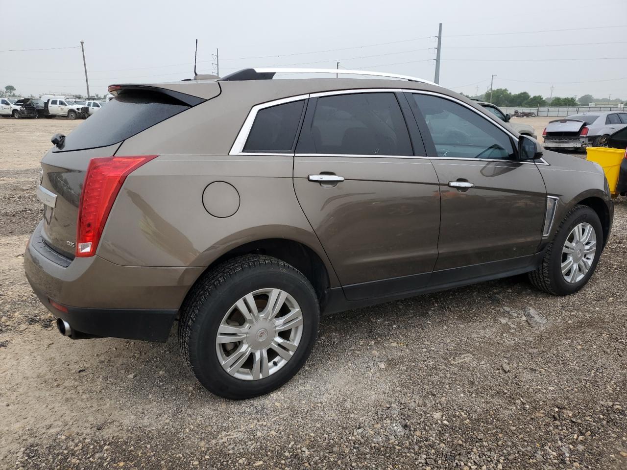 Photo 2 VIN: 3GYFNBE36GS509520 - CADILLAC SRX 