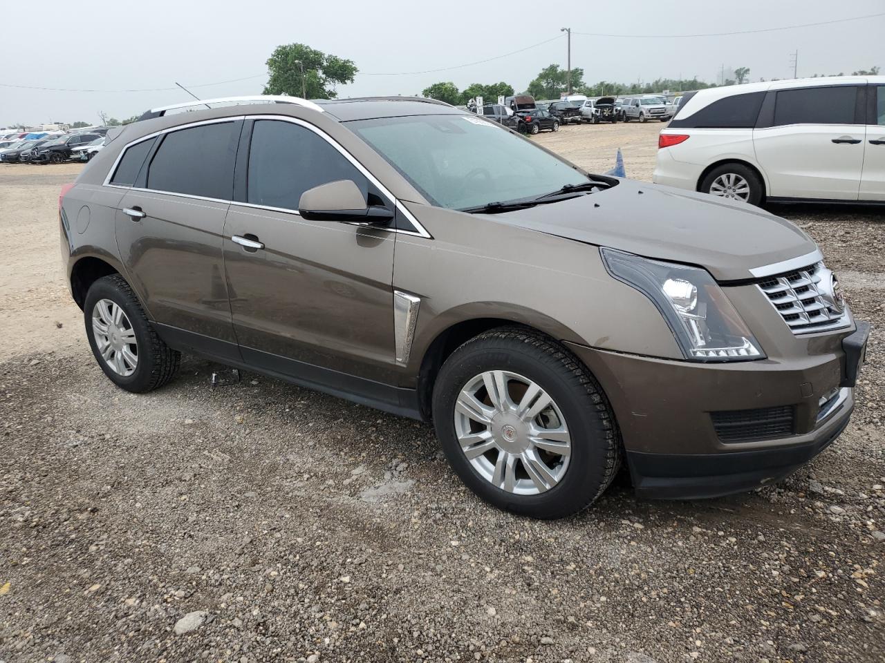 Photo 3 VIN: 3GYFNBE36GS509520 - CADILLAC SRX 