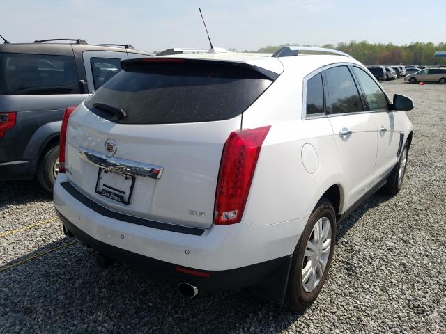 Photo 3 VIN: 3GYFNBE36GS554389 - CADILLAC SRX LUXURY 