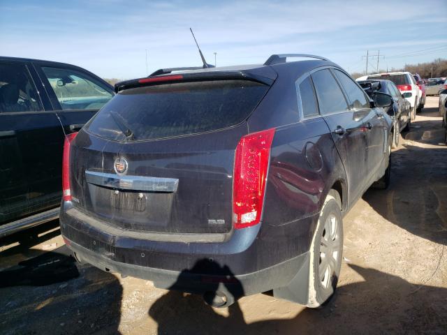 Photo 3 VIN: 3GYFNBE38ES562328 - CADILLAC SRX LUXURY 