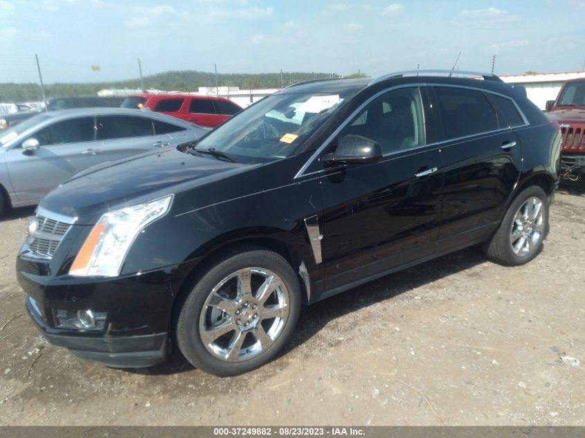 Photo 1 VIN: 3GYFNBE39CS599143 - CADILLAC SRX 