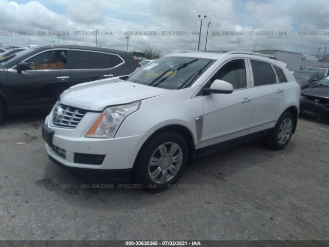 Photo 1 VIN: 3GYFNBE39ES524705 - CADILLAC SRX 