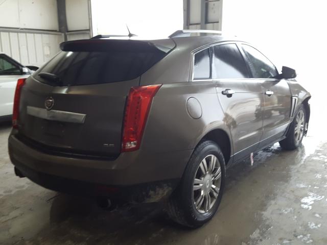 Photo 3 VIN: 3GYFNBE3XES590860 - CADILLAC SRX LUXURY 