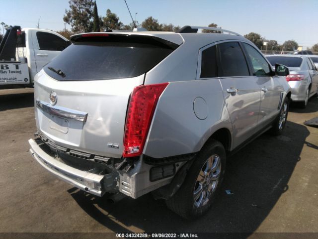 Photo 3 VIN: 3GYFNBE3XGS500299 - CADILLAC SRX 