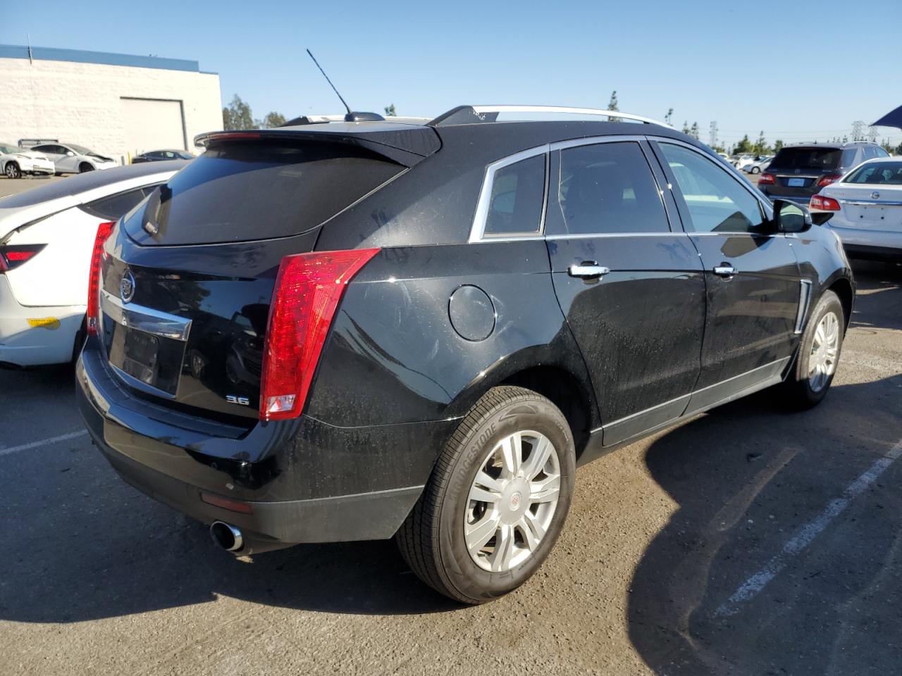 Photo 2 VIN: 3GYFNBE3XGS515224 - CADILLAC SRX 