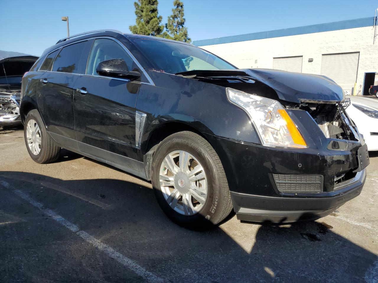 Photo 3 VIN: 3GYFNBE3XGS515224 - CADILLAC SRX 