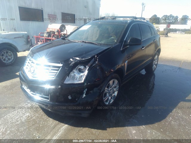 Photo 1 VIN: 3GYFNBE3XGS555416 - CADILLAC SRX 