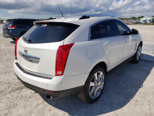 Photo 3 VIN: 3GYFNBEY3BS543127 - CADILLAC SRX PERFOR 