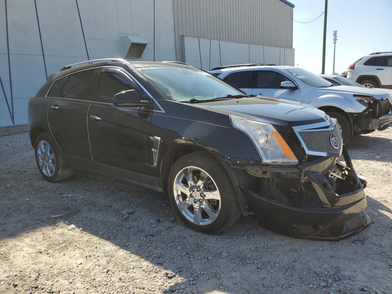 Photo 3 VIN: 3GYFNBEY5BS672373 - CADILLAC SRX 