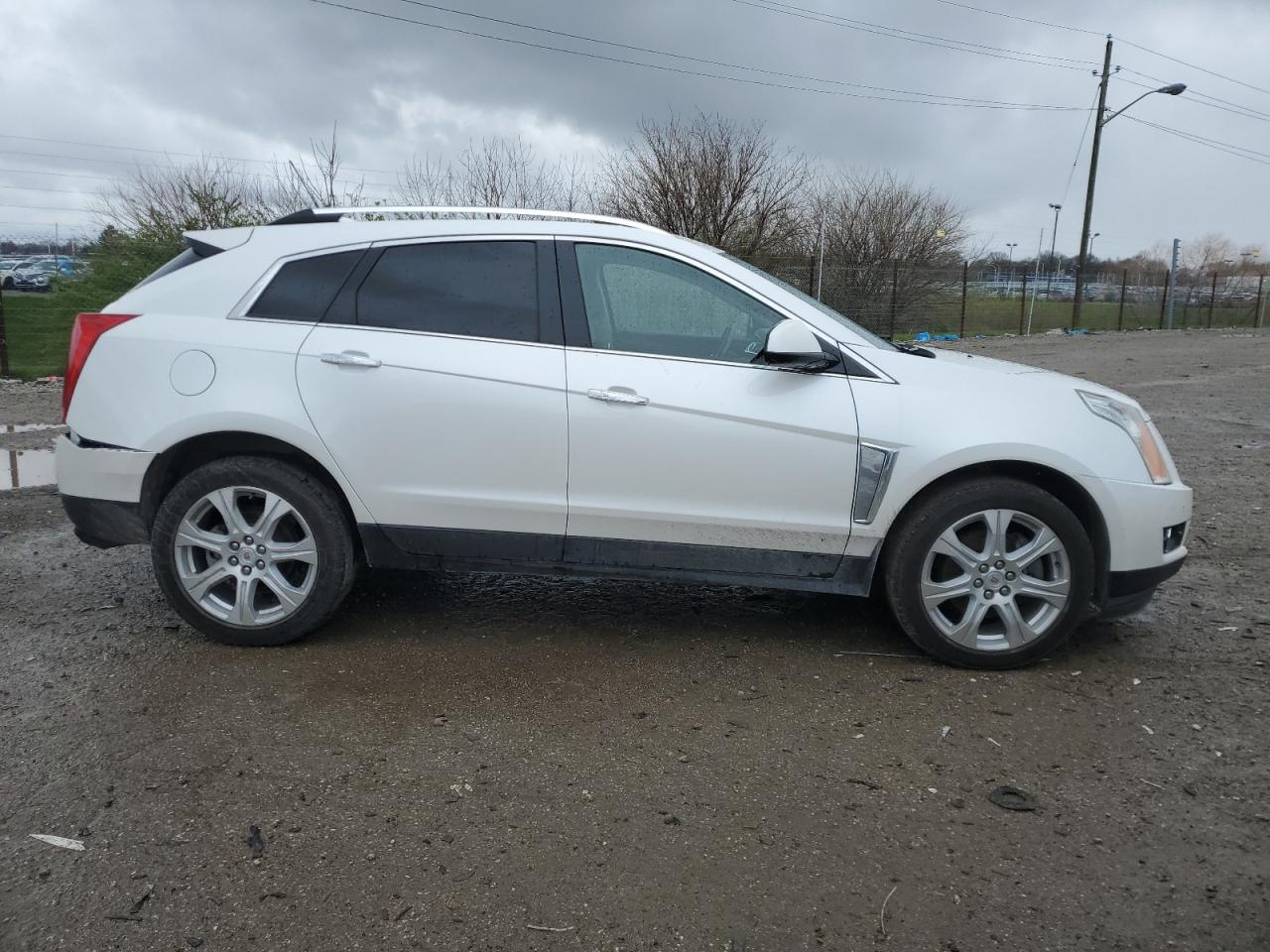 Photo 3 VIN: 3GYFNCE30GS546469 - CADILLAC SRX 