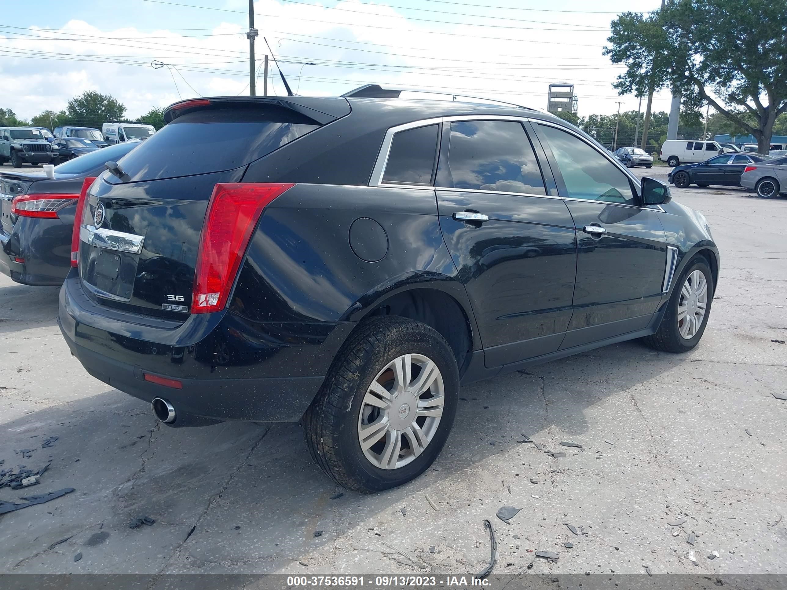 Photo 3 VIN: 3GYFNCE31DS563163 - CADILLAC SRX 