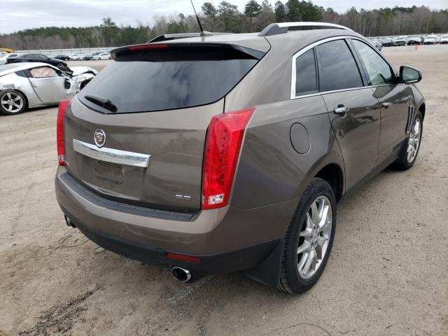 Photo 3 VIN: 3GYFNCE31ES544985 - CADILLAC SRX PERFOR 