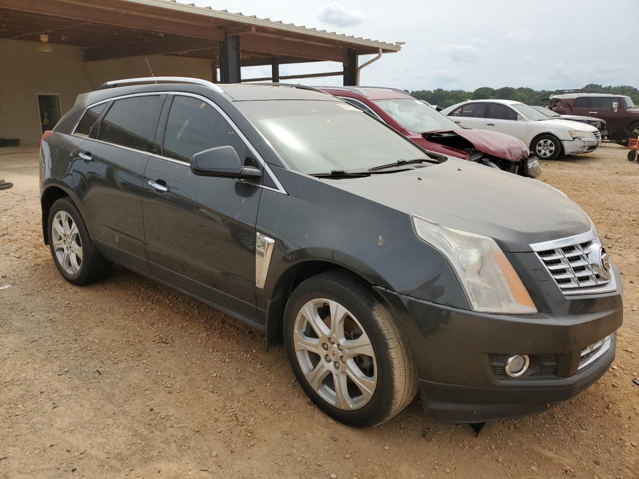 Photo 3 VIN: 3GYFNCE31ES548261 - CADILLAC SRX 