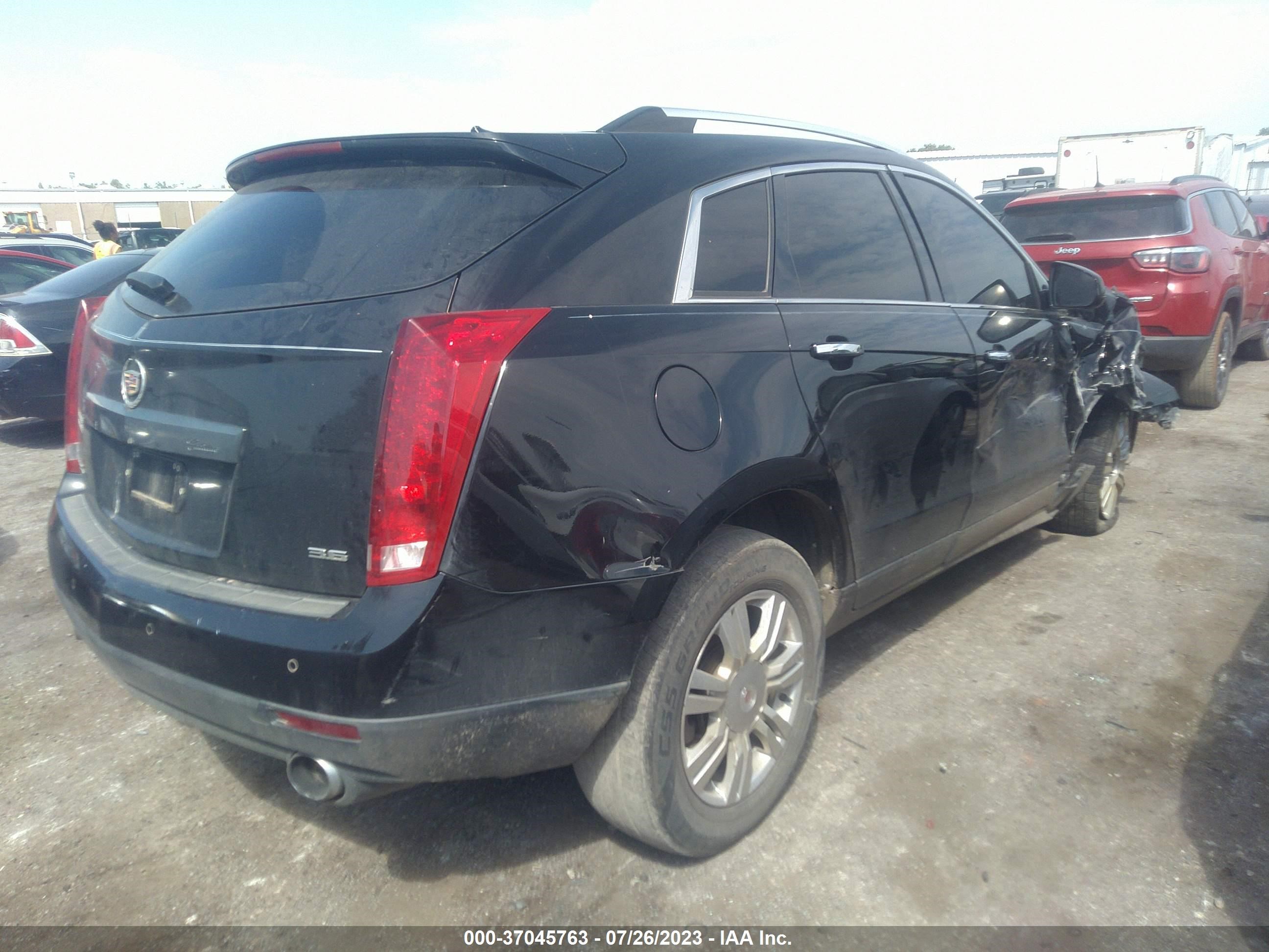 Photo 3 VIN: 3GYFNCE31ES565111 - CADILLAC SRX 