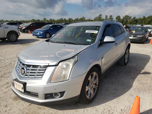 Photo 1 VIN: 3GYFNCE31ES669100 - CADILLAC SRX PERFOR 