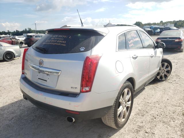 Photo 3 VIN: 3GYFNCE31ES669100 - CADILLAC SRX PERFOR 