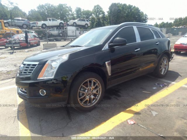 Photo 1 VIN: 3GYFNCE31GS561885 - CADILLAC SRX 