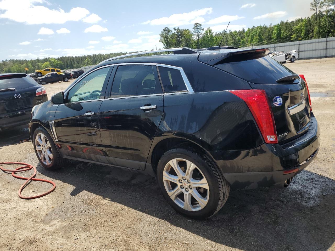 Photo 1 VIN: 3GYFNCE31GS571123 - CADILLAC SRX 