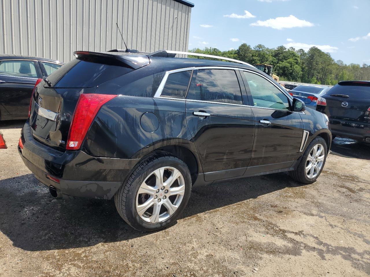 Photo 2 VIN: 3GYFNCE31GS571123 - CADILLAC SRX 