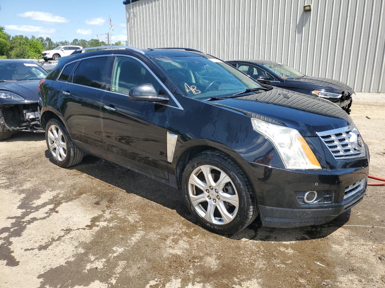 Photo 3 VIN: 3GYFNCE31GS571123 - CADILLAC SRX 