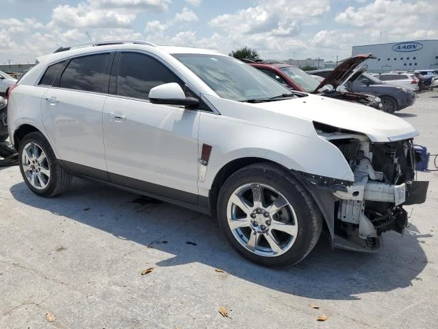 Photo 3 VIN: 3GYFNCE32CS609498 - CADILLAC SRX PREMIU 