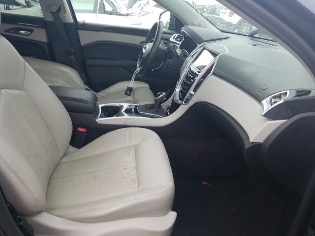 Photo 4 VIN: 3GYFNCE32ES556384 - CADILLAC SRX PERFOR 